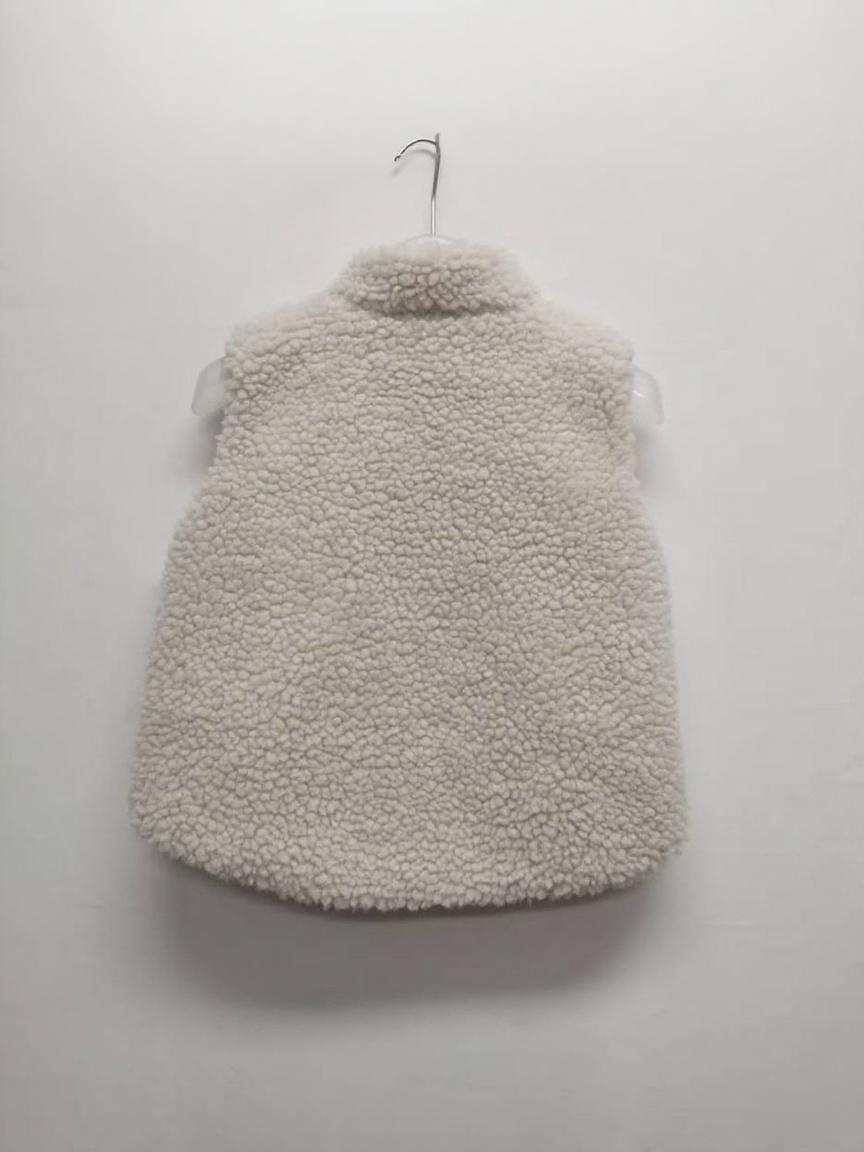 REVERSIBLE CHILDREN’S VEST FLEECE AND POLYESTER PRINT FABRIC